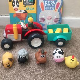 Selling a bundle of toys in good condition. Comes with a tractor some plastic animals and 2 animal books.