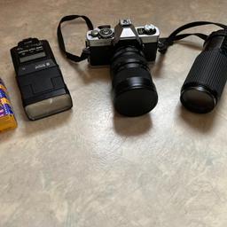 Hallo,

ich verkaufe hiermit die Kamera Minolta XG9 inkl. Blitz, 2. Objektiv, Film und grauer Tragetasche, welche sich in einem gebrauchten Zustand befindet.