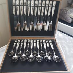 NEW in lovely silver boxed
25 piece cutlery set.