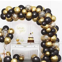 Black and gold balloon arch already blown up the whole thing . It just needs hanging.