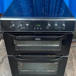 Hello welcome to my ad,This belling FSE60DOP 60cm double oven electric ceramic cooker comes in a black colour with four ceramic hob, hot hob indicator,programmable timer and minute minder for the main oven, double glazed doors and viewing windows, interior light,catalytic liners in both ovens making cleaning easy, defrost function, easy clean enamel,stylish knobs,three shelves, main oven is Electric fan assisted oven with 71 litres capacity while second oven (Top) is integrated variable electric grill with 35 litres capacity very clean and tidy dimensions are H:900 W:600 D:600 if interested cash on collection at B18 7QD 71 western road or delivery for extra fee, for more information about this cooker or any other items please feel free to message us thanks.