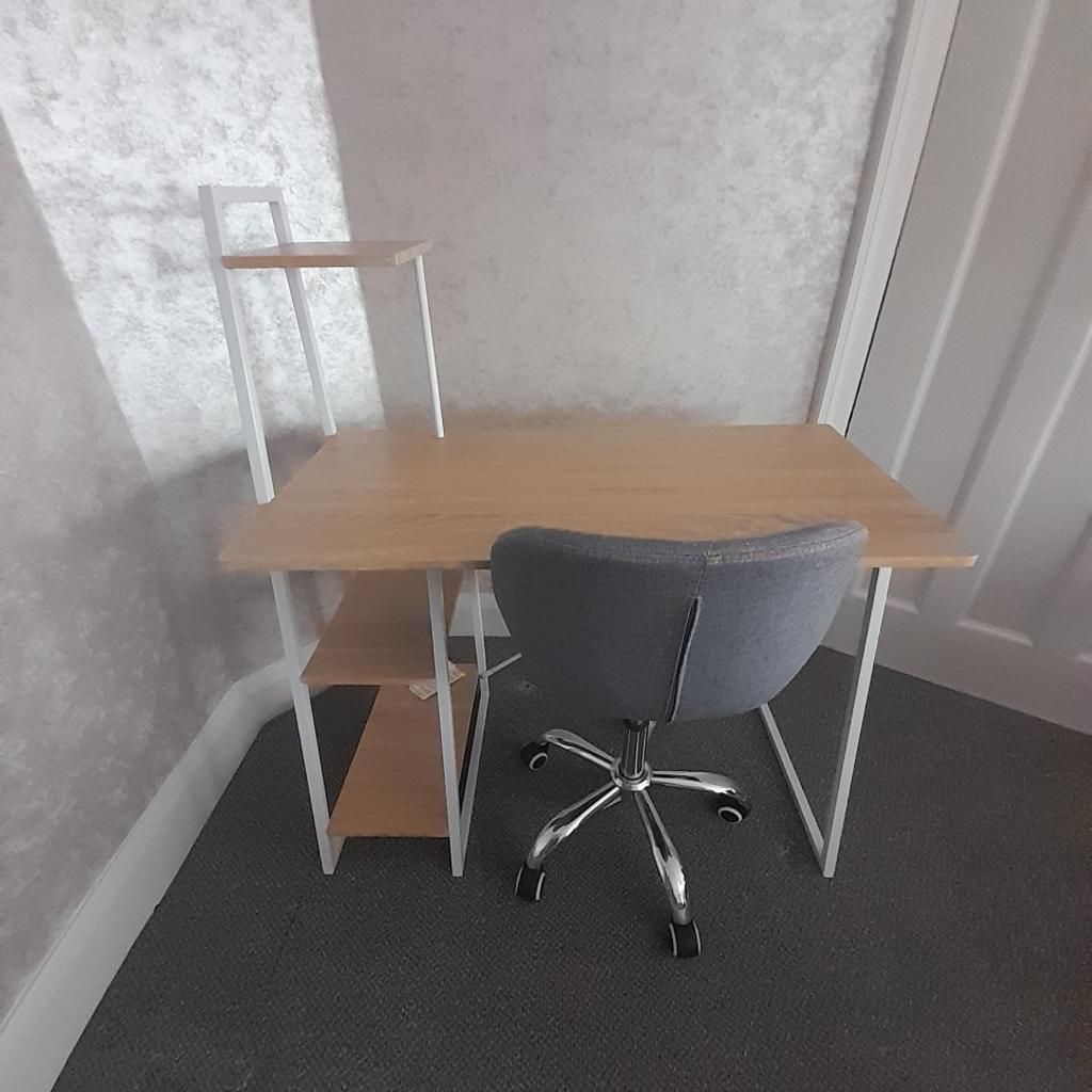 office table 1m in length and 50cm width.table height is 117cm but shelf can be removed to give height of 76cm.Grey chair is fully adjustable.Selling both together at this price.