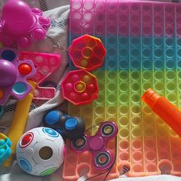 large bundle of fidget toys in very good condition