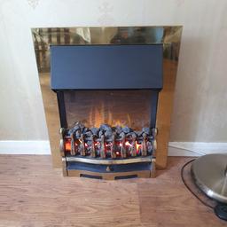 duplex electric fire real coal and affect coal, heavy brass surround. 3 settings good condition. lovley and cosy when on. flame affect can just be on.