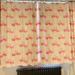 Laura Ashley flamingo curtains and matching single bedding.
The curtains are blackout so are heavy and hang well.
The curtains are in brilliant condition. The bedding has been washed (obviously!) and therefore has faded a little but is still in good condition.