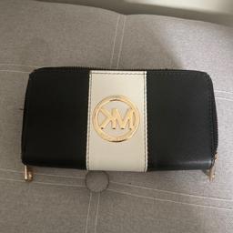 Mk ladies purse has been used still lots use left in it clean condition