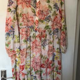 Floral dress 
Without slip dress 
Has a slight tear on the shoulder but can be stitched ( pic provided ) 
Size 18/20 however worn on a size 14