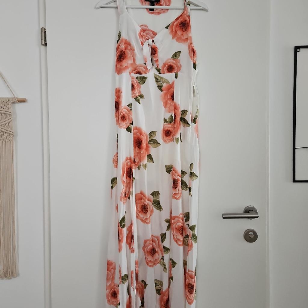 weißes, langes Kleid
Blumenprint
mit Knopf am Dekollete
Schlitze an den Beinen
Größe S
Forever 21