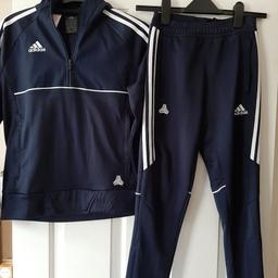 Adidas tracksuit, top age 11/12 bottoms age 9/10. worn but still in good condition. pick up only