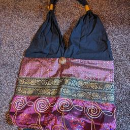 A beautiful bag -photos don't do it justice. A new item which has never been used.