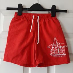 Size 4 baby swimming shorts, hardly worn good condition.