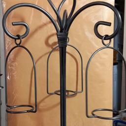 large heavy wrought iron candle holder 
solid heavy substantial piece. in great condition see images for details.