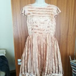 Peach Skater Dress.
Size 16.
From Maya Deluxe.
Excellent condition, new with tags.
