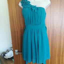 Teal Flower Shoulder Dress.
Stretch back.
Size 12
From New Look.
Excellent condition.