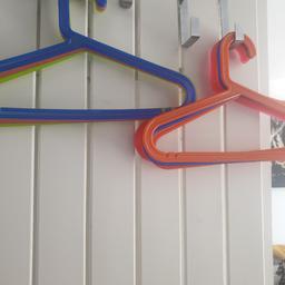 10 plastic 4 different colour hangers.