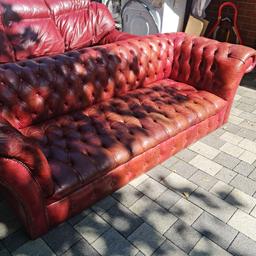 Large Chesterfield that can sit x4 reasonably sized people. Colour: burgundy (not red). In a separate picture are the feet for the sofa that screw into place. Certain parts of the seat is slightly worn as shown in the pictures and requires some leather treatment balm easily purchased. This is a reluctant sale as I am typing this. BUYER COLLECT FROM Bloxwich area WS3. Cash on collection. NO time wasters please as we need the sofa gone to make space