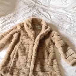 New Look faux fur ladies jacket size 14 in immaculate condition 1st 2c will buy. See photos for condition size flaws materials etc. I can offer try before you buy option if you are local but if viewing on an auction site viewing STRICTLY prior to end of auction.  If you bid and win it's yours. Cash on collection or post at extra cost which is £4.55 Royal Mail 2nd class. I can offer free local delivery within five miles of my postcode which is LS104NF. Listed on five other sites so it may end abruptly. Don't be disappointed. Any questions please ask and I will answer asap.
Please check out my other items. I have hundreds of items for sale including bikes, men's, womens, and children's clothes. Trainers of all brands. Boots of all brands. Sandals of all brands. 
There are over 50 bikes available and I sell on multiple sites so search bikes in Middleton west Yorkshire.
