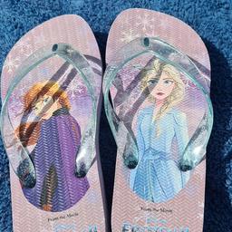 Kids Elsa and Anna Frozen 2 flip flops child's size 11 excellent meticulously cleaned condition. See photos for condition size flaws materials etc. I can offer try before you buy option if you are local but if viewing on an auction site viewing STRICTLY prior to end of auction.  If you bid and win it's yours. Cash on collection or post at extra cost which is £2.85 Royal Mail 2nd class. I can offer free local delivery within five miles of my postcode which is LS104NF. Listed on five other sites so it may end abruptly. Don't be disappointed. Any questions please ask and I will answer asap.
Please check out my other items. I have hundreds of items for sale including bikes, men's, womens, and children's clothes. Trainers of all brands. Boots of all brands. Sandals of all brands. 
There are over 50 bikes available and I sell on multiple sites so search bikes in Middleton west Yorkshire.