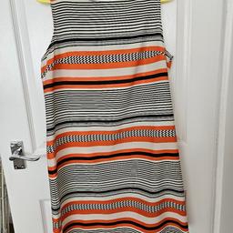 Funky style summer dress, size 14. Polyester material. 
Orange, black, cream
pattern. 
Buyer collects