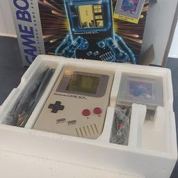 Original 1990's Gameboy DMG 01 boxed and working. Complete with Tetris game, 2 player connector cabel, headphones (sealed) and instruction booklets. Some marks on the box but what you might expect from something this age. Offers of £250 or more only.