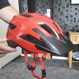 Selling a Cherry Red Specialized Cycle Helmet ,Youtys Size 52-57 cm,Good used Condition from smoke and Pet free home.