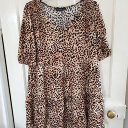 F+F Womens Dress, size 12. Black and brown leopard print patturn, thin slightly stretchy material, round-neck with 3/4 sleeves with tight elasticated wrists.
Knee length dress with elastic at waist and thigh for a fitted look.
Excellent condition, like new, only worn once. 

Safe collection available or delivery can be arranged for a small charge
Shipped within 24hrs if using Royal Mail or Yodel.
