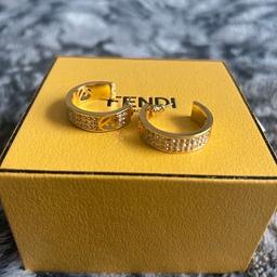 Gold Fendi style earrings