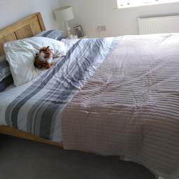 King size bed made from Mango wood, from Oak Furniture Land. only slept in twice. Assemble instructions easy.
Has a Orthopaedic mattress,
Sold with mattress protector, fitted sheet, king size quilt, quilt cover, pillows and pillowcases.
Collection only. £500.00 ono