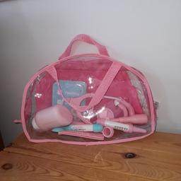 Pink doctors bag and equipment..