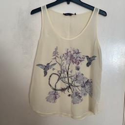 Beautiful 100% pure silk tank top in a cream colour with birds and flowers print from French Connection.

This top was never worn and is in a pristine condition. The silk material feels very lightweight, super soft and smooth, perfect for hot summer days.

It can be worn on its own as well as layered on top.

UK Size: 10
Pit to Pit: 42cm / 16.5"
Length: 65cm / 25.5"
Material: 100% Silk

#sleeveless #animal #tank #roundneck #y2k paris girly print pattern flower floral rose hummingbird bird nature natural boho modern tshirt retro cami camisole vest top