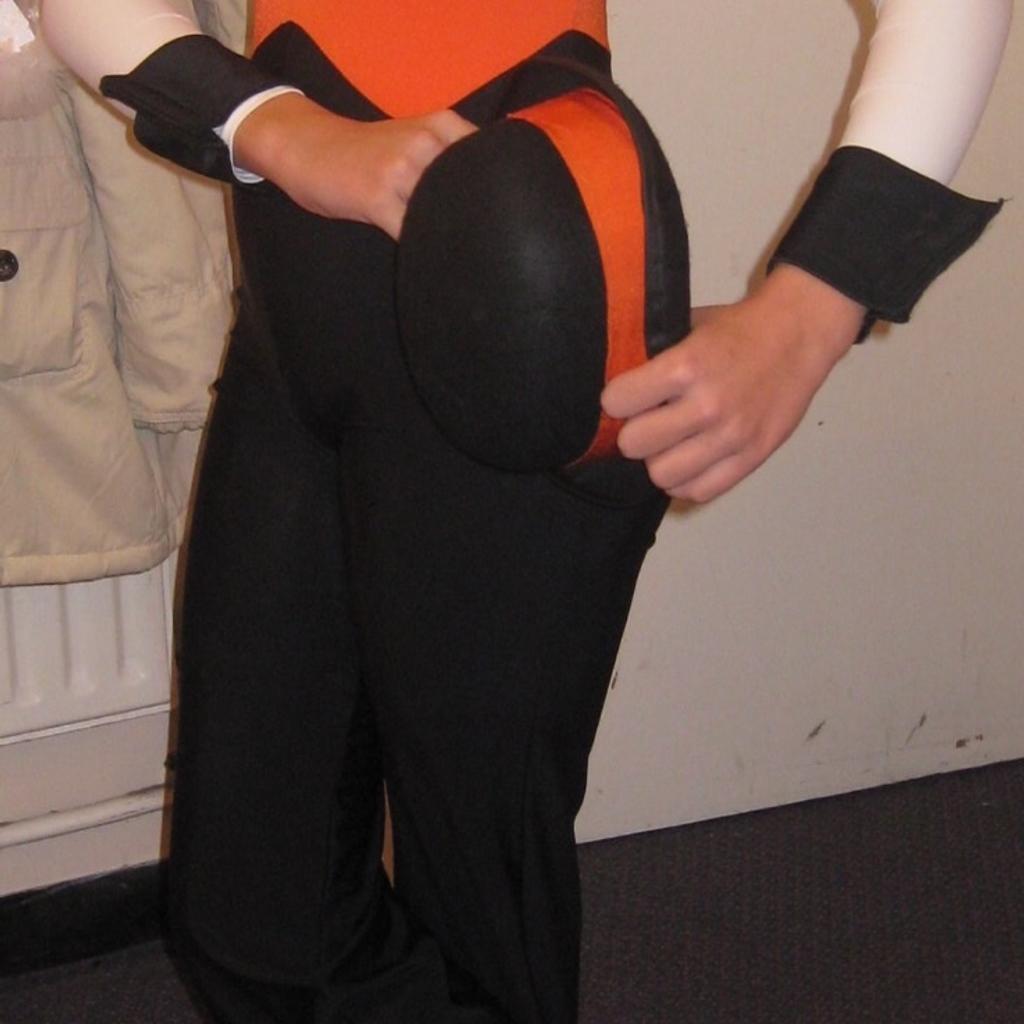 Black, White & Orange Lycra Dance Costume.
All in one Lycra costume.
Sizes - Trouser from top to bottom 40” inside leg 30” Waistline 22”
Arm shoulder to cuff 21” Top shoulder to waist 13”
Hat not included