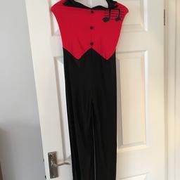 Halter neck costume with separate red cuffs.
Hand painted.
Size - Trouser from top to bottom 41”. Inside leg 33”
Waist 22” Under arm to waist 7”