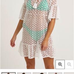 Brand new with tag cream beach cover up size medium