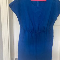 Blue jumpsuit with belt like new from shein
Never worn wrong size bought