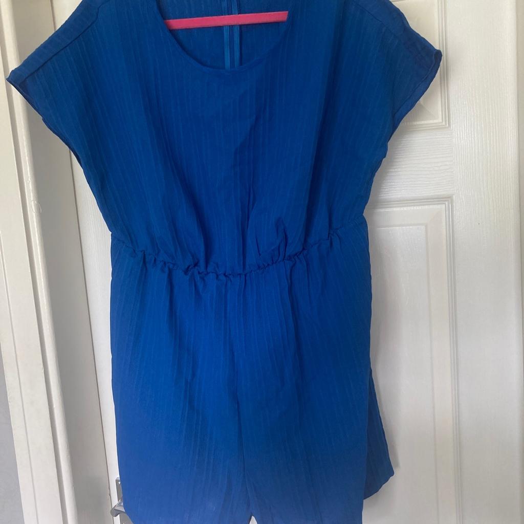 Blue jumpsuit with belt like new from shein
Never worn wrong size bought