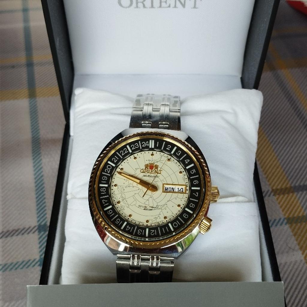 Orient mechanical watch, brand new with tags. The screen map adjusts to the time zone you're in .