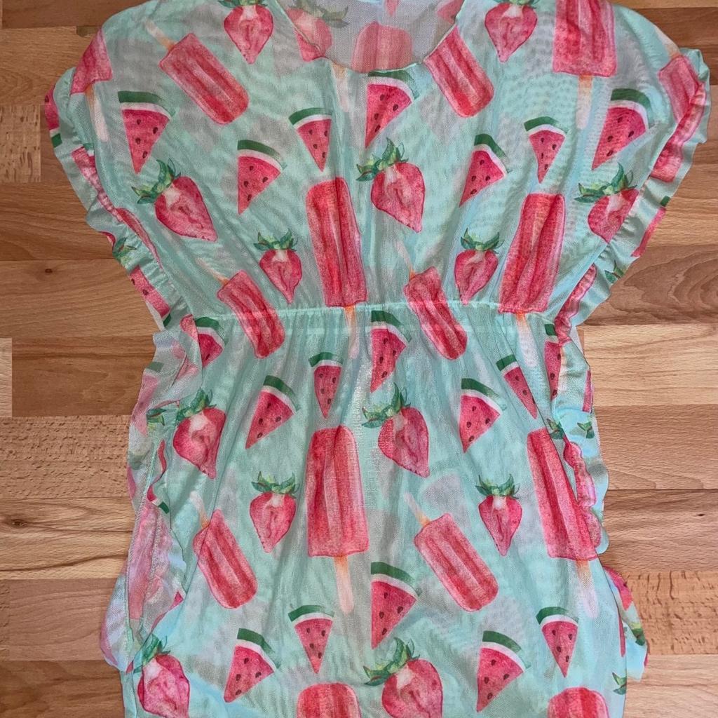 Like new wore twice. Beach cover up/ kaftan. Size is 11-12 but would fit 9-10 as small fit