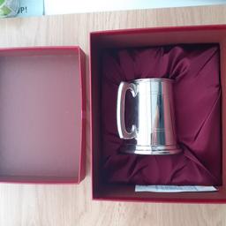 Brand new Pewter tankard never used still in packaging. Designed to be engraved and given as a gift.