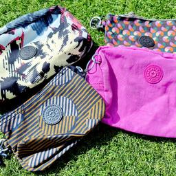 3 used Kipling pouches,and one small purse.Several sizes and colours as seen in photos. All zips working.Cost of UK mainland delivery included.See other listing for a batch of Kipling purses and card wallet.