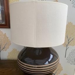 Brown and cream lamp base with cream shade
18.25 inches or 46.5 cm 