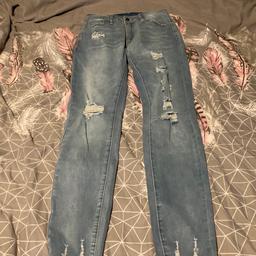New ladies size medium ripped jeans