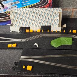 This is an original vintage complete set of the Goodwood chicane track. It has its original box as pictured. Also includes the cones, hay bales, fences, clips etc. 
£45.00 ono. 
Postage is tracked, and is £4.00.