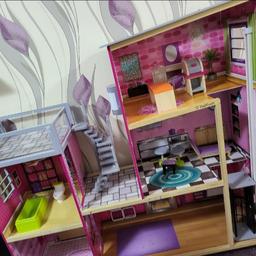 KidkraftUptown Dollhouse Doll House with Some Accessories.