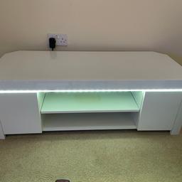 Tv unit with led light 
Has a scratch along top