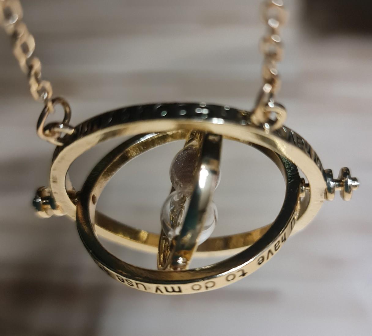 Orecchino Harry Potter Zeitumkehrer (Gira Tempo) Colore Argento - Gioiello Ufficiale Per Fan - Regalo Originale