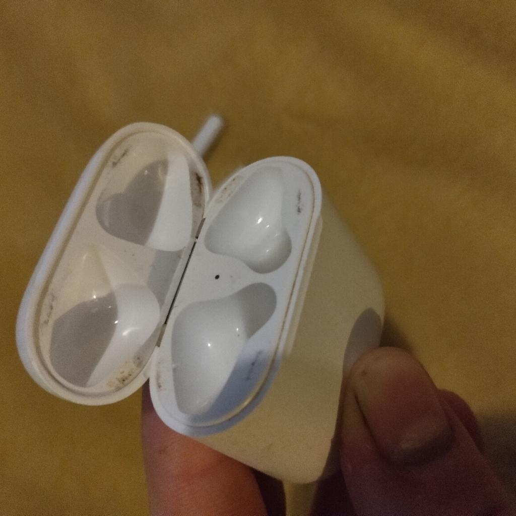 apple airpods,1st gen in working order,usual signs of wear and tear around the inner lid but nothing bad. serious buyers only,any questions please ask before making offers or buying,no time wasters