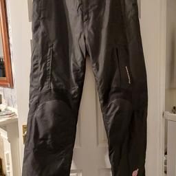 brand new size 18 motorbike trousers. bought never worn. Still have tags on.
