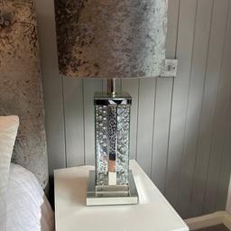 Absolutely stunning large silver table lamp with floating diamonds with grey velour shade. In immaculate condition lamp stand measures 50cm.
Shade is 35cm diameter
Any questions please ask happy to help
Collection from ware