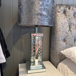 Absolutely stunning large silver table lamp with floating diamonds with grey velour shade. In superb condition but does have one small crack line in the base as shown in photos .lamp stand measures 50cm.
Shade is 35cm diameter
Any questions please ask happy to help
Collection from ware