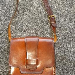 Excellent quality Vintage Boho bag from around 1960/70.
Made from the finest thick Honey colour Leather, it has an adjustable shoulder strap and push through fastening.
You won't find another like it or in better condition.
Any questions or more photos required please contact me.
(item is quite heavy hence the postage)
